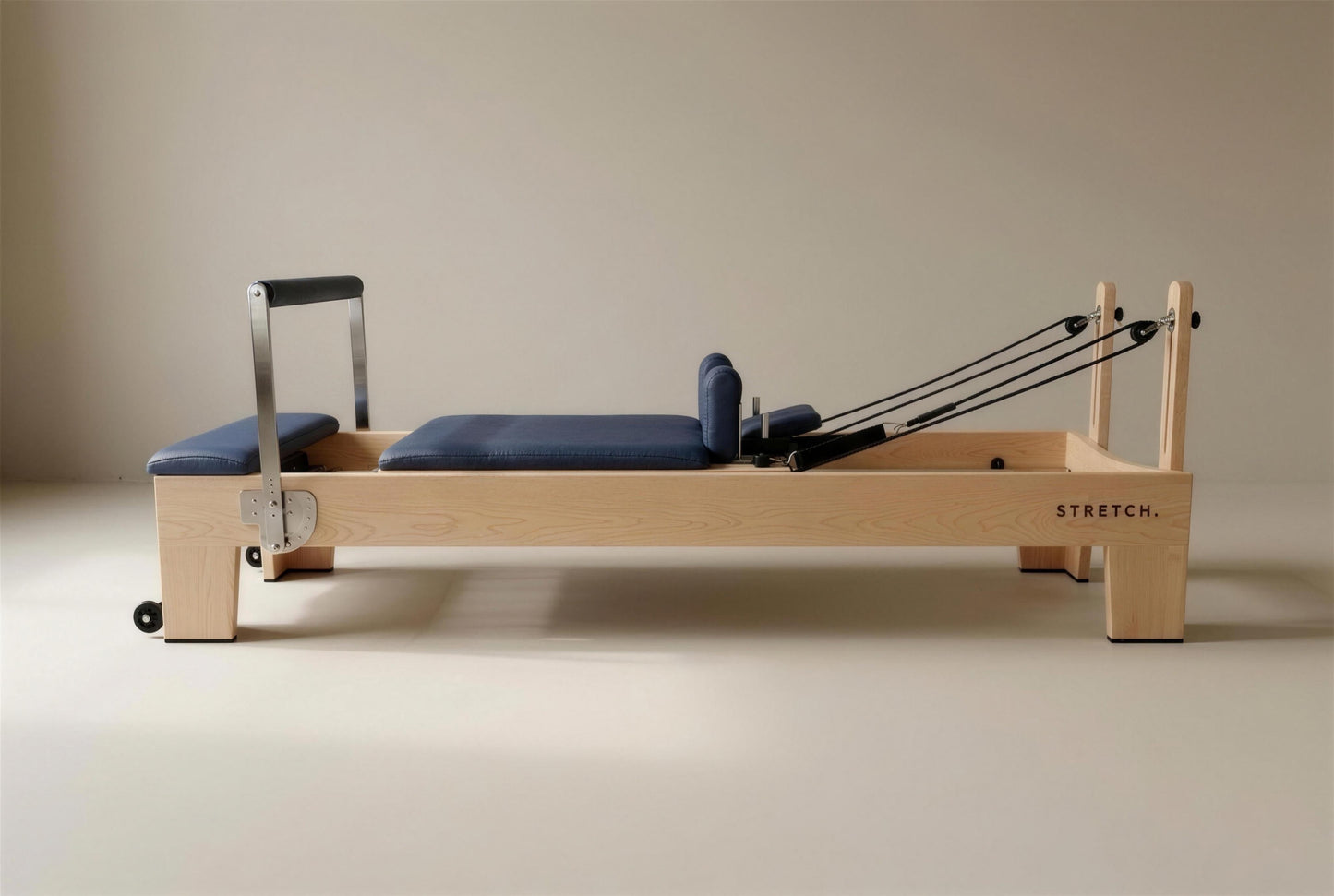 STRETCH S1 Maple Edition in Navy leather on a solid maple frame