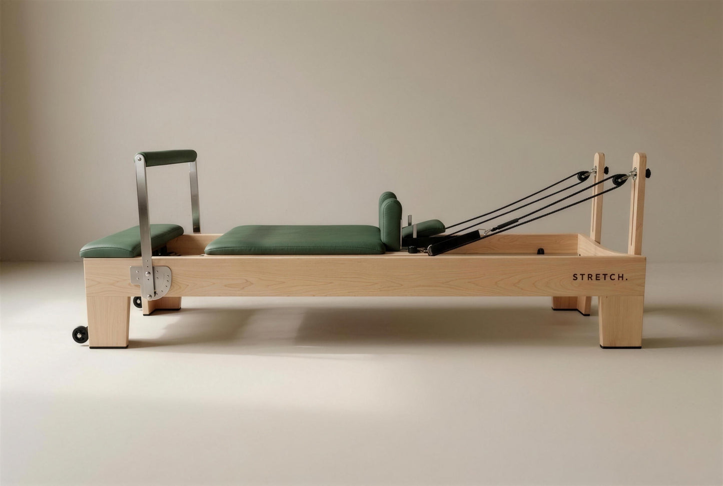 STRETCH S1 Maple Edition in Forest Green leather on a solid maple frame