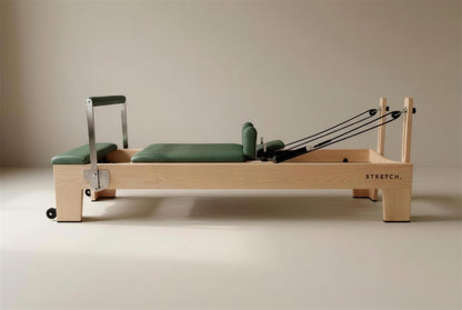 STRETCH S1 Maple Edition in Forest Green leather on a solid maple frame
